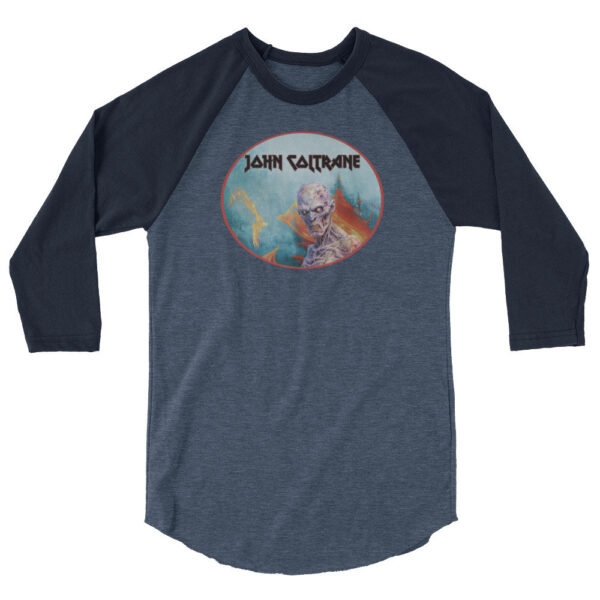 Front view of a navy blue and heathered raglan shirt printed with an oval horror-themed illustration of a zombie skull in a burning landscape, marked “John Coltrane.”