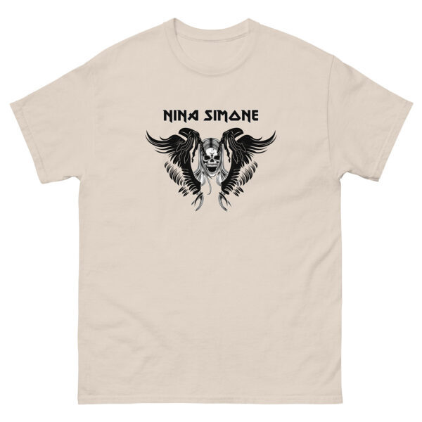 Light beige t-shirt printed with a black gothic winged skull graphic and the name “Nina Simone” displayed in a bold, spiked font.