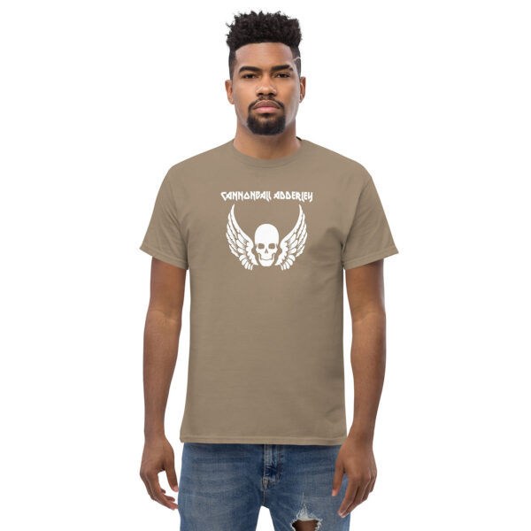 Front-facing view of taupe t-shirt worn by model, featuring Cannonball Adderley skull and wing artwork.