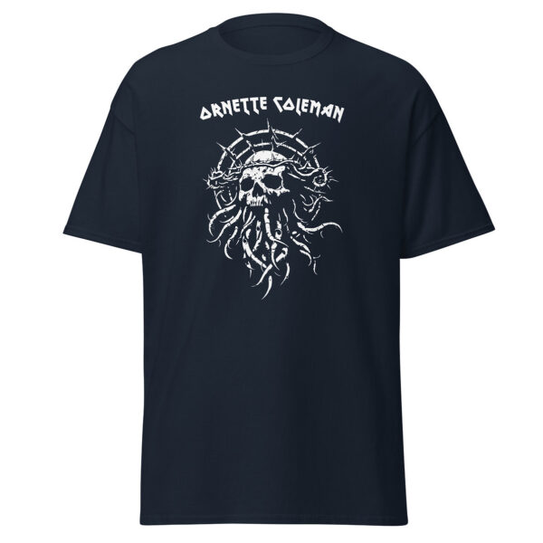 Unisex navy blue t-shirt displaying a white skeletal skull wrapped in a crown of thorns and branching tendrils, under the name “Ornette Coleman” in jagged uppercase text.