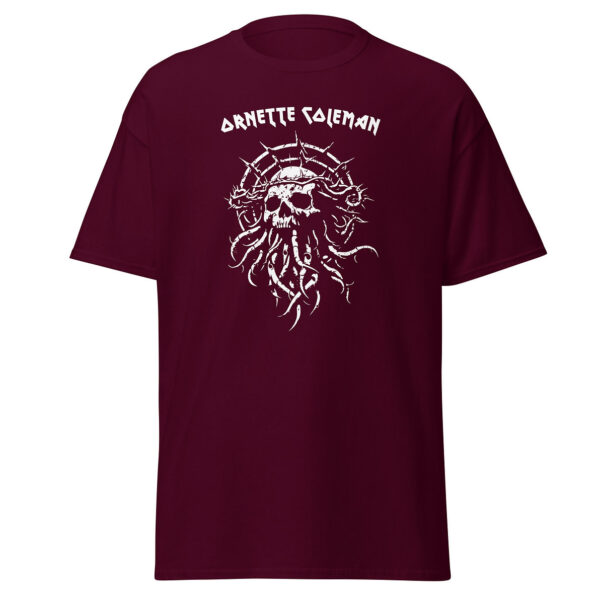 Unisex maroon t-shirt featuring a stark white graphic of a thorn-wrapped skull with curling tentacles beneath the name “Ornette Coleman” in stylized lettering.