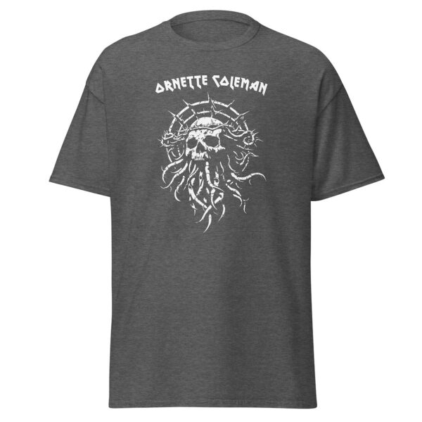 Unisex dark grey heather t-shirt printed with a white thorny skull design with twisting tendrils and the name “Ornette Coleman” arched above in angular white font.