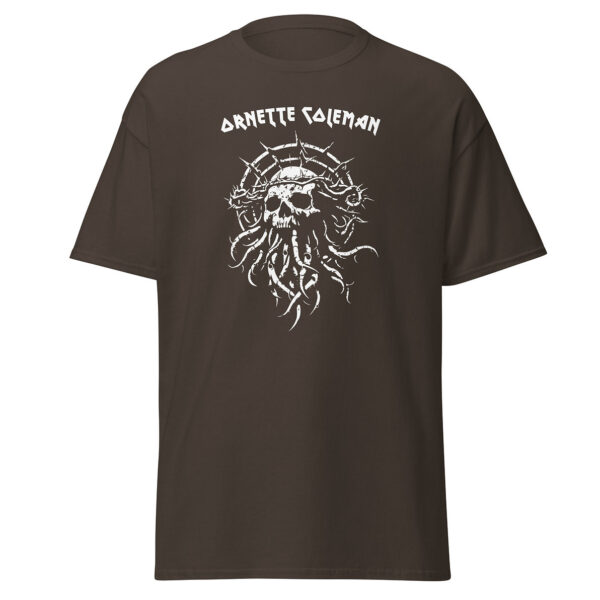 Unisex dark brown t-shirt featuring a white skeletal skull wrapped in thorns and tentacles beneath the name “Ornette Coleman” in jagged uppercase type.