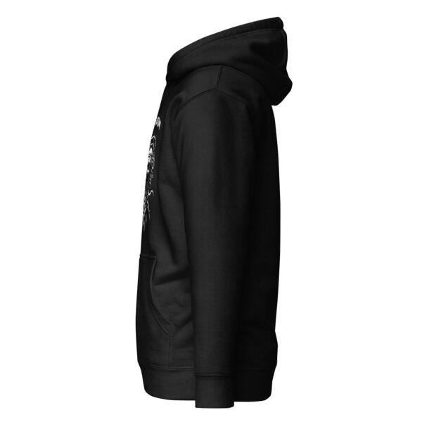 Side view of black unisex pullover hoodie with front pocket and partial view of white “Alice Coltrane” skull and thorn design.
