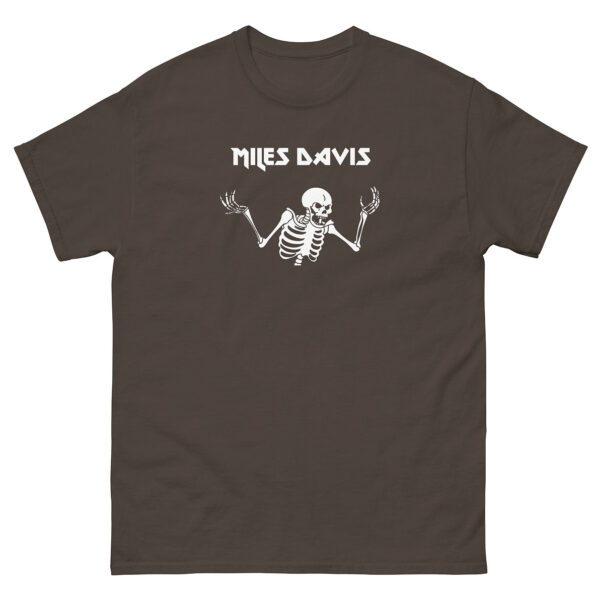 Brown unisex t-shirt featuring a white line illustration of a skeleton shrugging with “Miles Davis” above in angular font.
