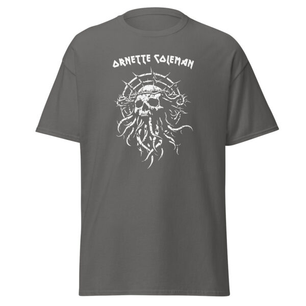 Unisex asphalt grey t-shirt with a white graphic on the chest showing a skeletal skull entwined in thorny branches and tentacle-like strands, topped by the name “Ornette Coleman” in stylized uppercase text.