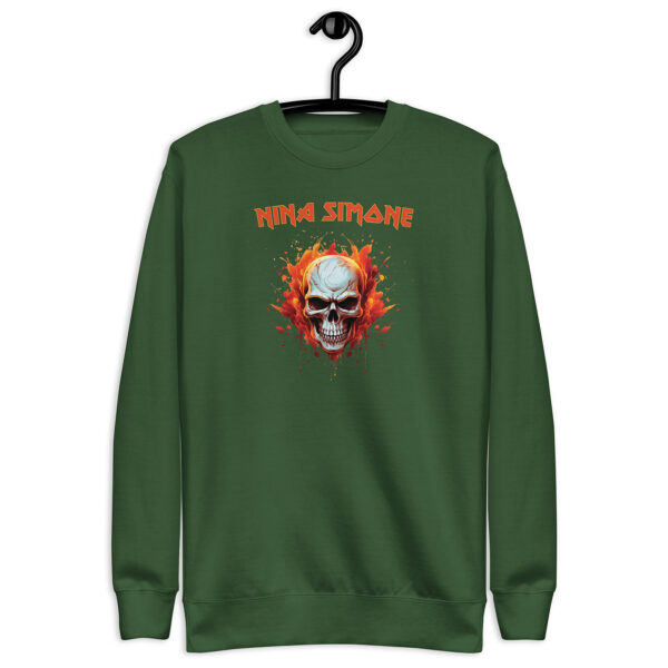 Forest Green crewneck sweatshirt on hanger with a flaming skull graphic and the text “NINA SIMONE” in orange, in a bold, rock-style font.