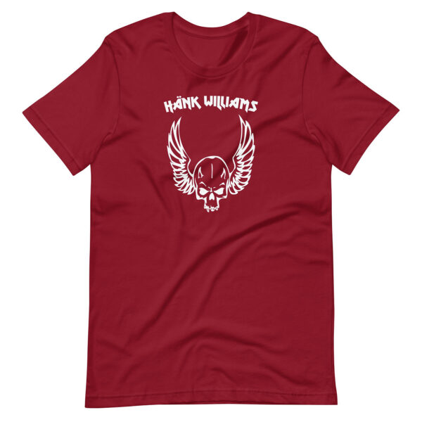 Deep red t-shirt showcasing white artwork of a skull with open wings and “Hank Williams” lettering at the top