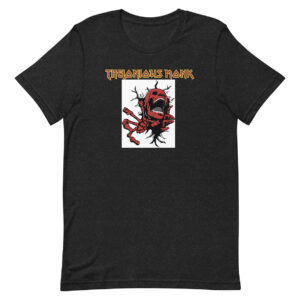 Black heather t-shirt displaying a vivid red skeletal figure bursting through a white box, with black cracks extending from the tear. The phrase “THELONIOUS MONK” appears above in angular gold and red lettering.