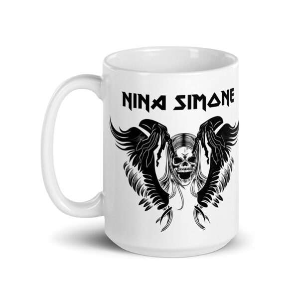 White ceramic mug, front view, with winged skull illustration and “Nina Simone” in heavy black font