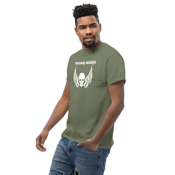 Model wearing an olive green Cannonball Adderley t-shirt with white skull and feathered wing design.