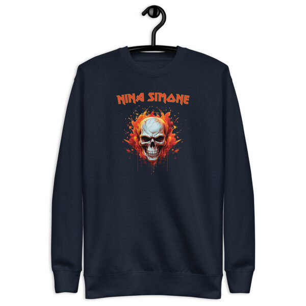 Navy crewneck sweatshirt on hanger with a flaming skull graphic and the text “NINA SIMONE” in orange, in a bold, rock-style font.