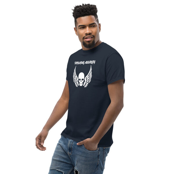 Man in a navy t-shirt with a white winged skull graphic and "Cannonball Adderley" text.