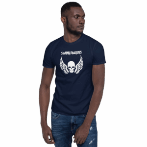 Navy Sonny Rollins t-shirt worn by a model with a centered white graphic of a skull with outstretched wings and angular white “Sonny Rollins” text above.