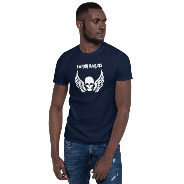 Navy Sonny Rollins t-shirt worn by a model with a centered white graphic of a skull with outstretched wings and angular white “Sonny Rollins” text above.