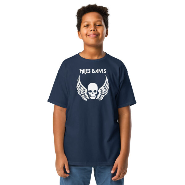 Front view of the same design on a navy blue T-shirt worn by the same smiling child. Their pose is identical, with hands down and feet apart.