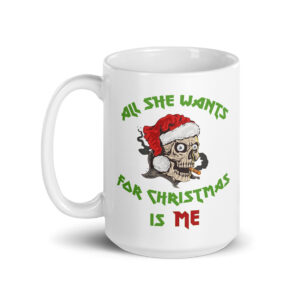 White ceramic mug featuring a cartoon skull wearing a Santa hat and smoking a cigarette, surrounded by the text “All she wants for Christmas is me” in green and red lettering.