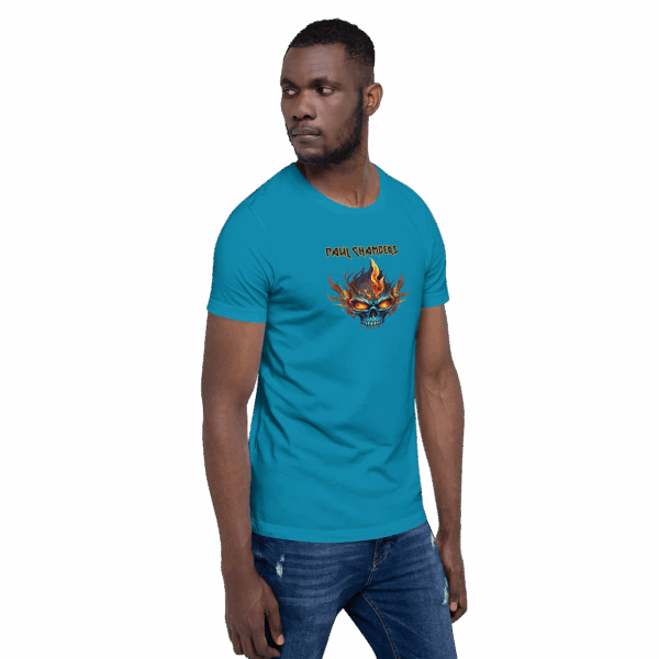 Man wearing an ocean blue t-shirt with a flaming skull and “PAUL CHAMBERS” text on the front, turned slightly to the side.