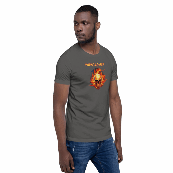 Man in the gray “Papa Jo Jones” flaming skull tee looking to his left, with hands by his sides.