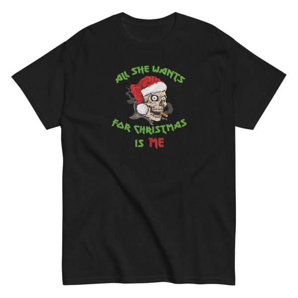 Black short-sleeve t-shirt featuring a cartoon skull in a red Santa hat smoking a cigarette. Green and red text surrounds the image, reading: "All She Wants For Christmas Is Me."