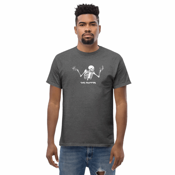 Man wearing a dark heather gray t-shirt with a white skeleton graphic and the text “Cat Popper,” standing straight and facing forward with a neutral expression.