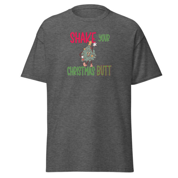 Dark heather gray short-sleeve t-shirt with a playful Christmas design featuring the phrase "Shake Your Christmas Butt" in red, green, and brown text, surrounding a cartoon Christmas tree character dancing joyfully.