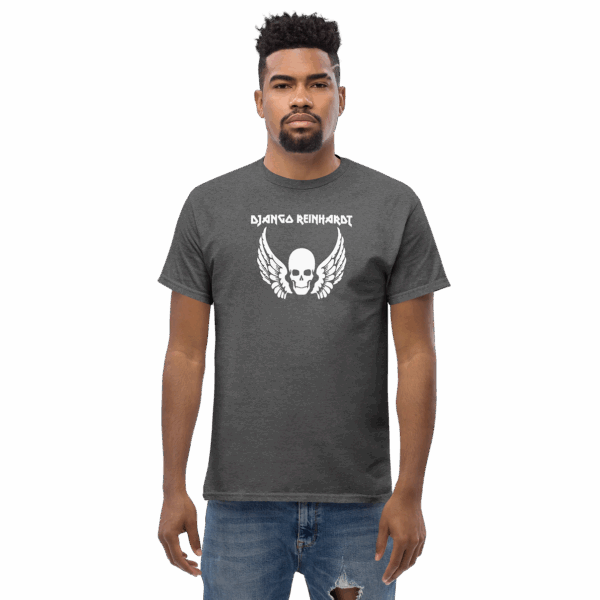 Front-facing Django Reinhardt t-shirt in charcoal gray, worn by model, showing white skull and feathered wings below heavy white text.
