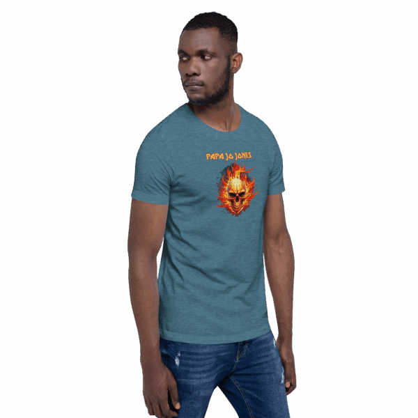 Heather teal t-shirt, side view with front-facing flaming skull and orange text; model looking off to the side.