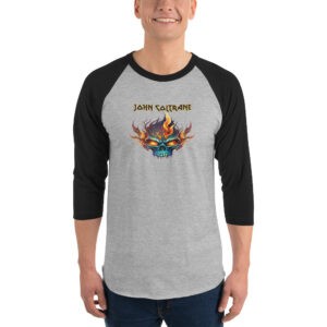 Light grey and black raglan shirt with flaming skull art centered under John Coltrane styled in heavy metal typography