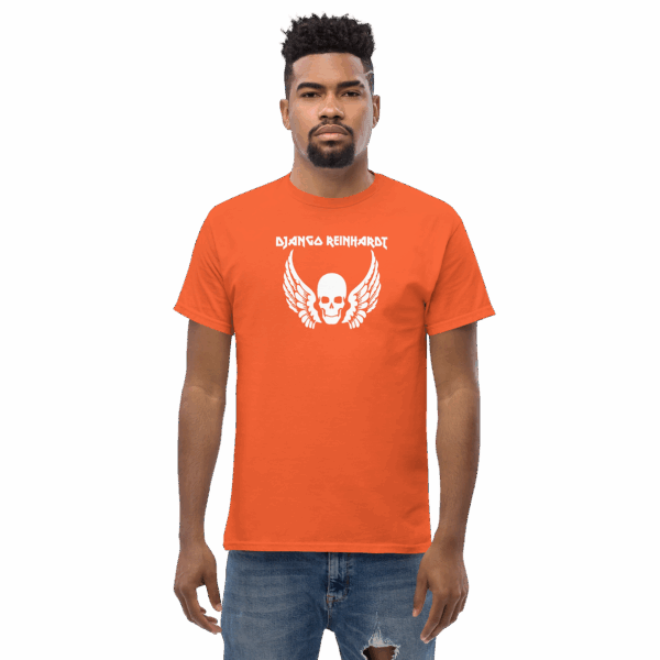 Model wearing an orange t-shirt with a white “Django Reinhardt” skull and wings graphic, facing forward.