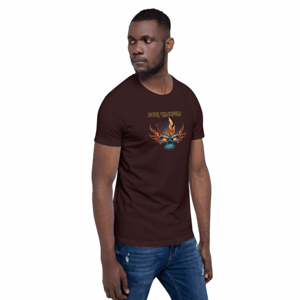 Man in a maroon graphic t-shirt with a flaming skull design and the text “PAUL CHAMBERS,” looking to the side.