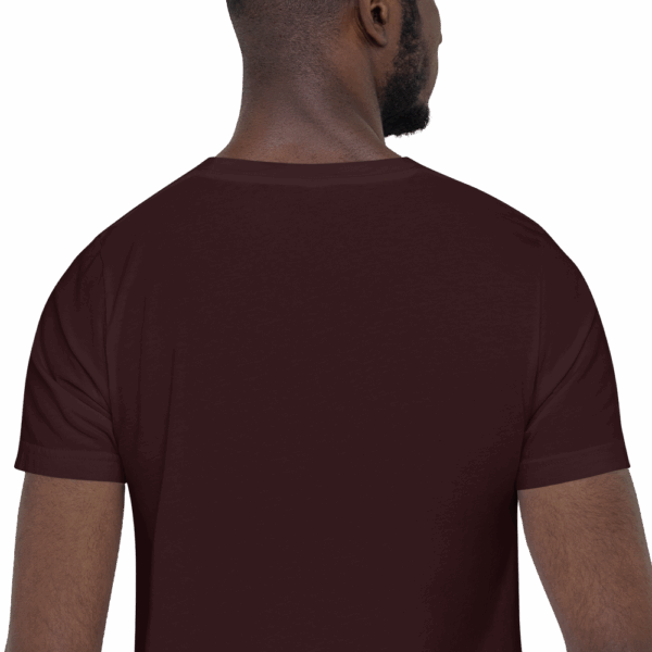 Back view of a man wearing a maroon crew neck t-shirt, showing shoulder seams and short sleeves.