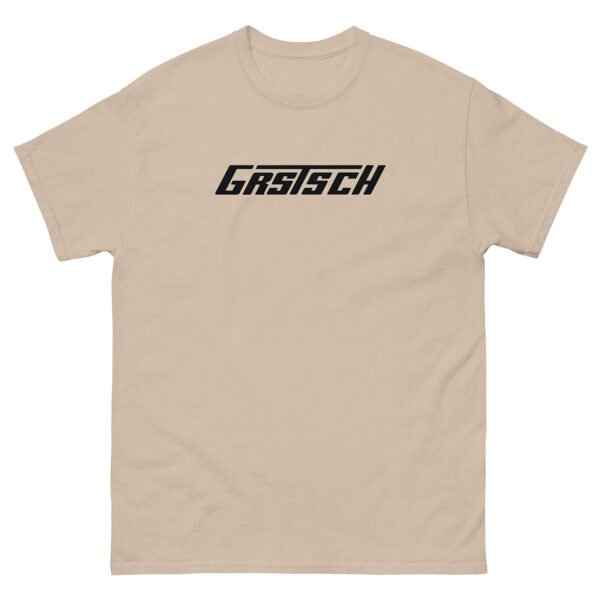 A beige t-shirt featuring the word “Grstsch” in a bold, black, modern typeface centered on the chest.