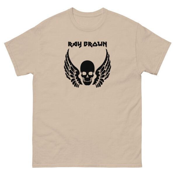 Tan/beige unisex tee, front view displaying the black skull and wings with "Ray Brown" above.
