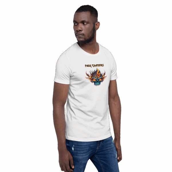 Man wearing a white t-shirt with a flaming skull graphic and “Paul Chambers” text, standing in a relaxed pose looking to the side.