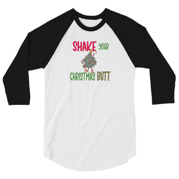 White and black raglan sleeve shirt featuring the text "Shake Your Christmas Butt" with a cartoon Christmas tree character dancing in the center.