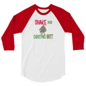 White and red raglan sleeve shirt featuring the text "Shake Your Christmas Butt" with a cartoon Christmas tree character dancing in the center.
